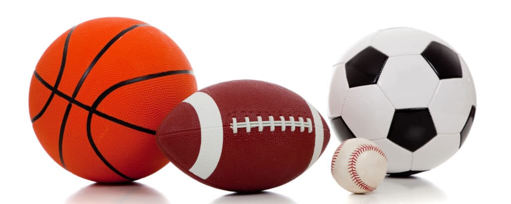 sports gear including basketball, football, soccer ball and baseball, Fundamental Youth Sports Littleton Colorado